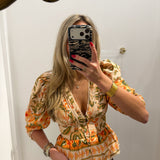 LBK ORANGE FLORAL PEPLUM BUTTON TOP