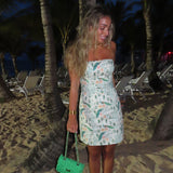STRAPLESS PEACOCK BELTED DRESS