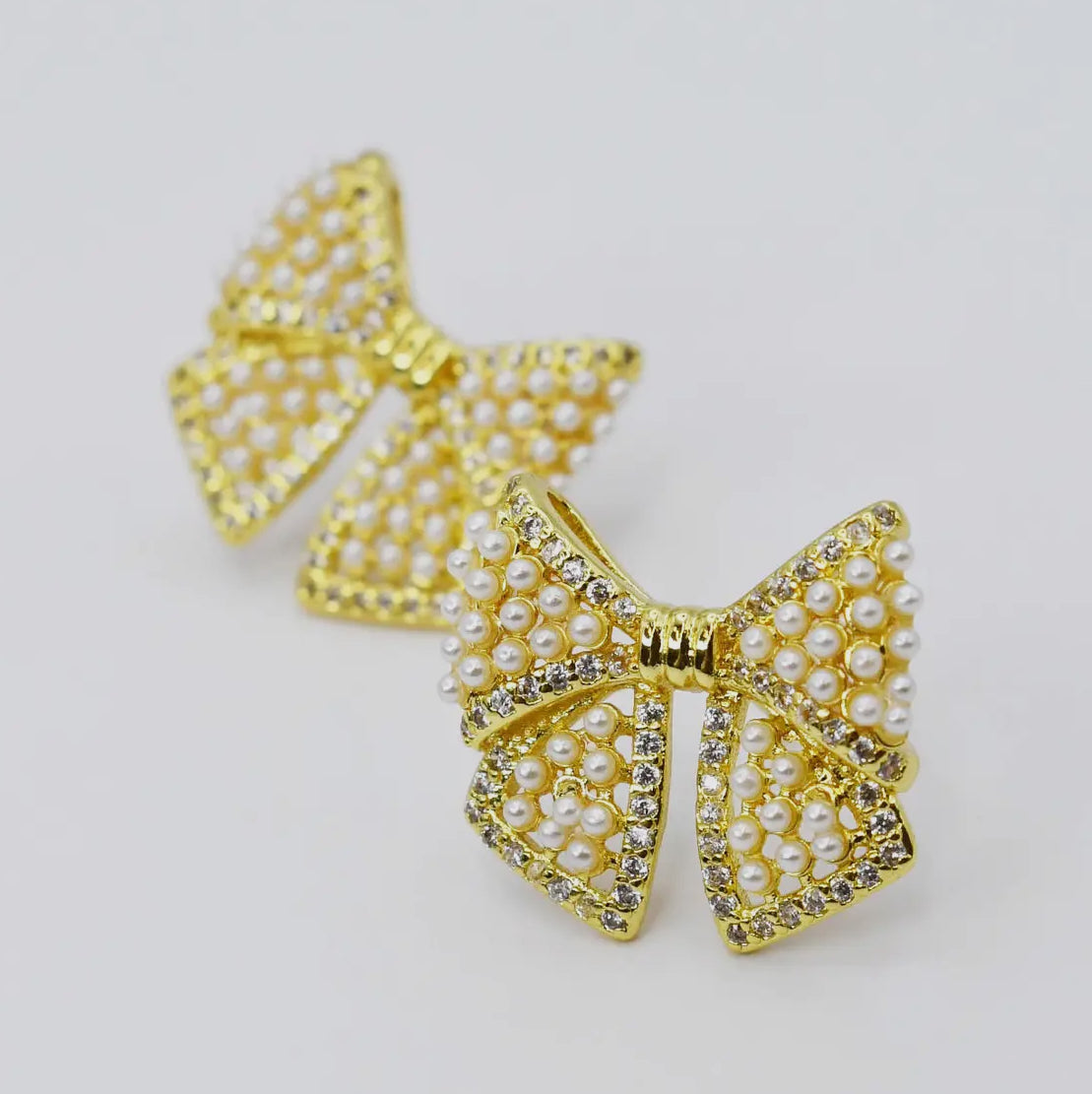 COQUETTE STUDD EARRINGS