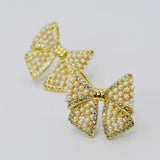 COQUETTE STUDD EARRINGS