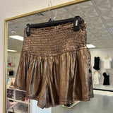 Gold Shimmer Shorts (size medium left)